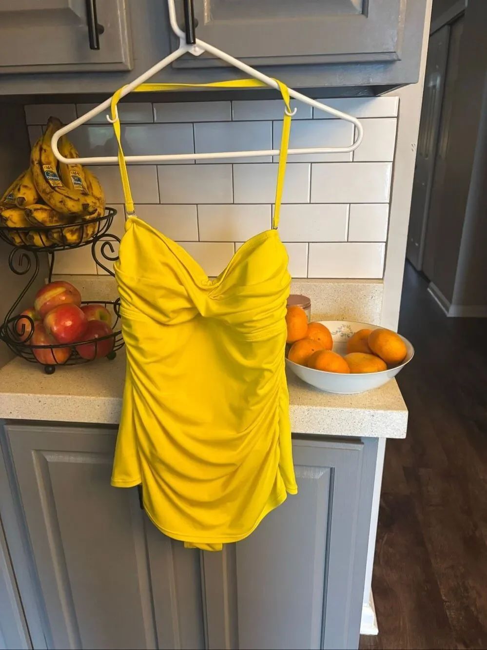 Two women’s one piece bathing suits